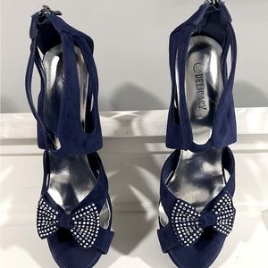 Delicacy brand/blue open toe/zippered back  heel with rhinestone bow. Size 10